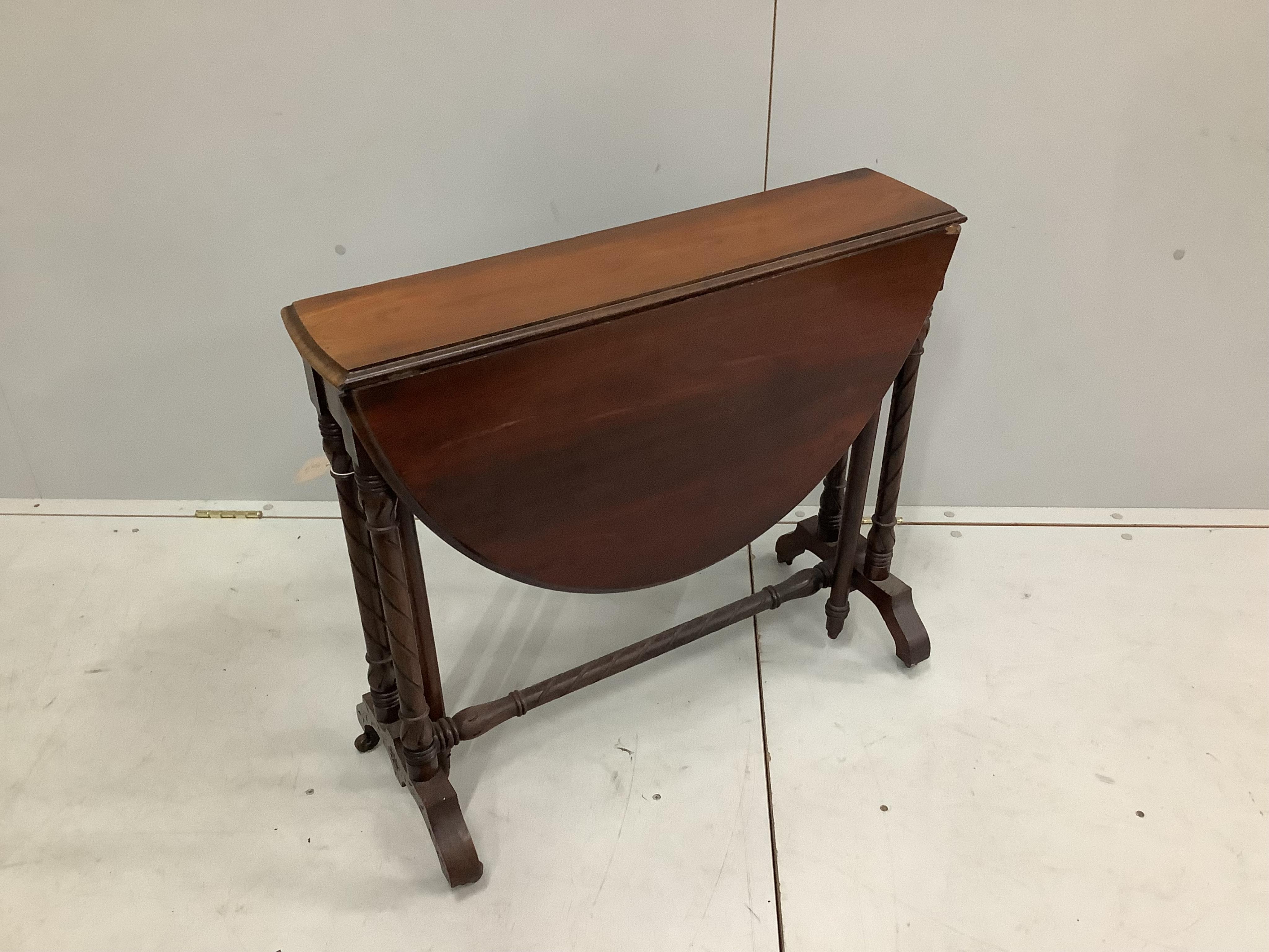 A Victorian mahogany Sutherland table, width 75cm, height 66cm, together with a late Victorian mahogany two tier occasional table. Condition - fair